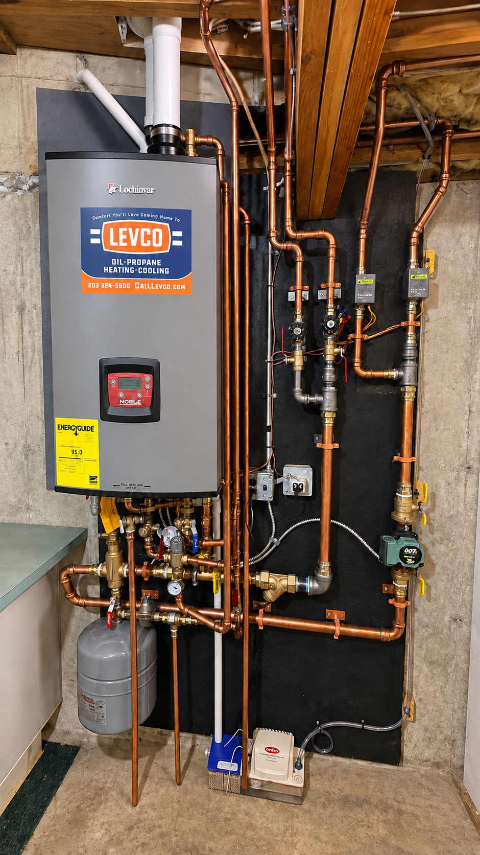 Completed Levco propane heating system with finished copper piping in a Connecticut basement