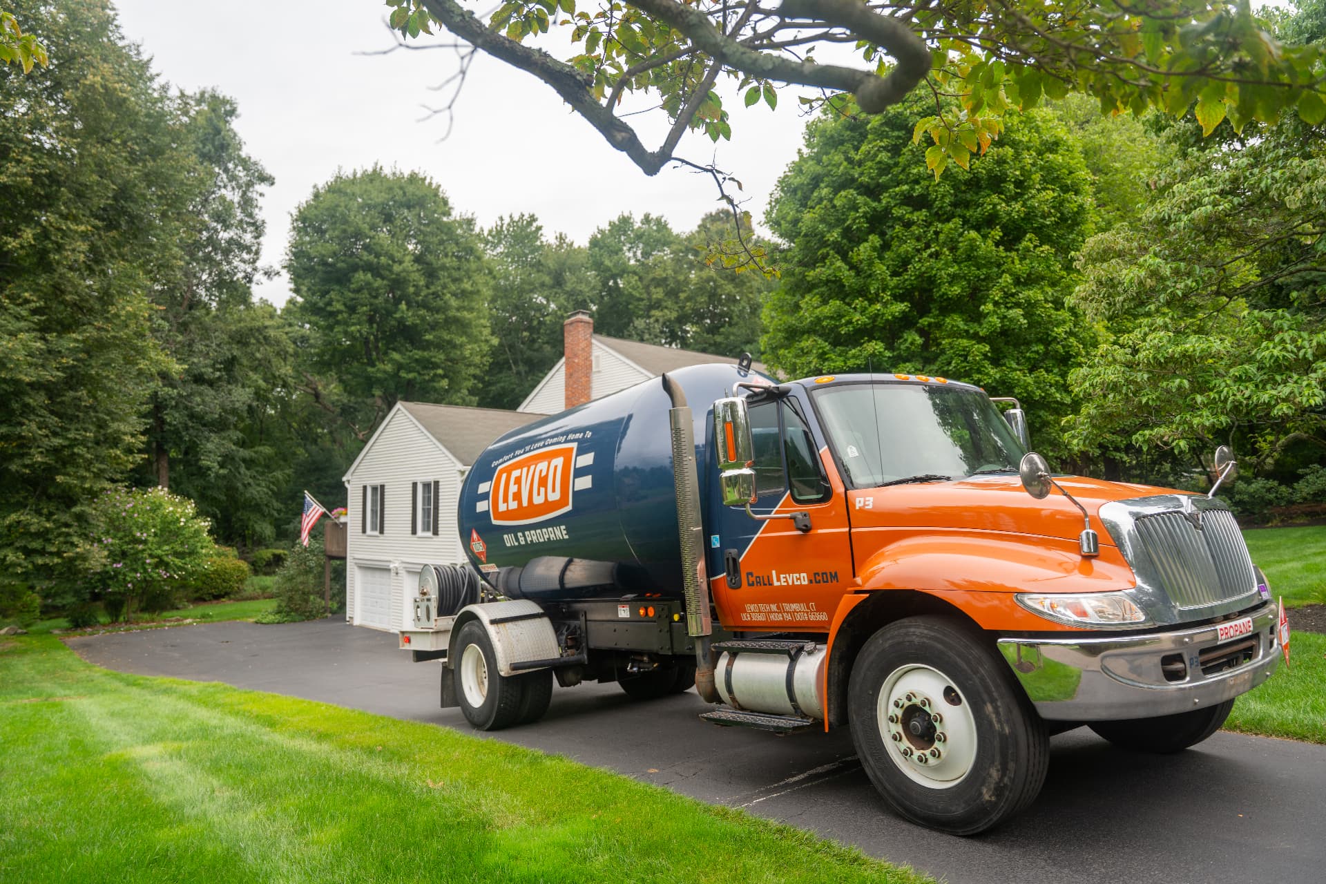 Levco propane delivery truck parked in the driveway of a Connecticut home