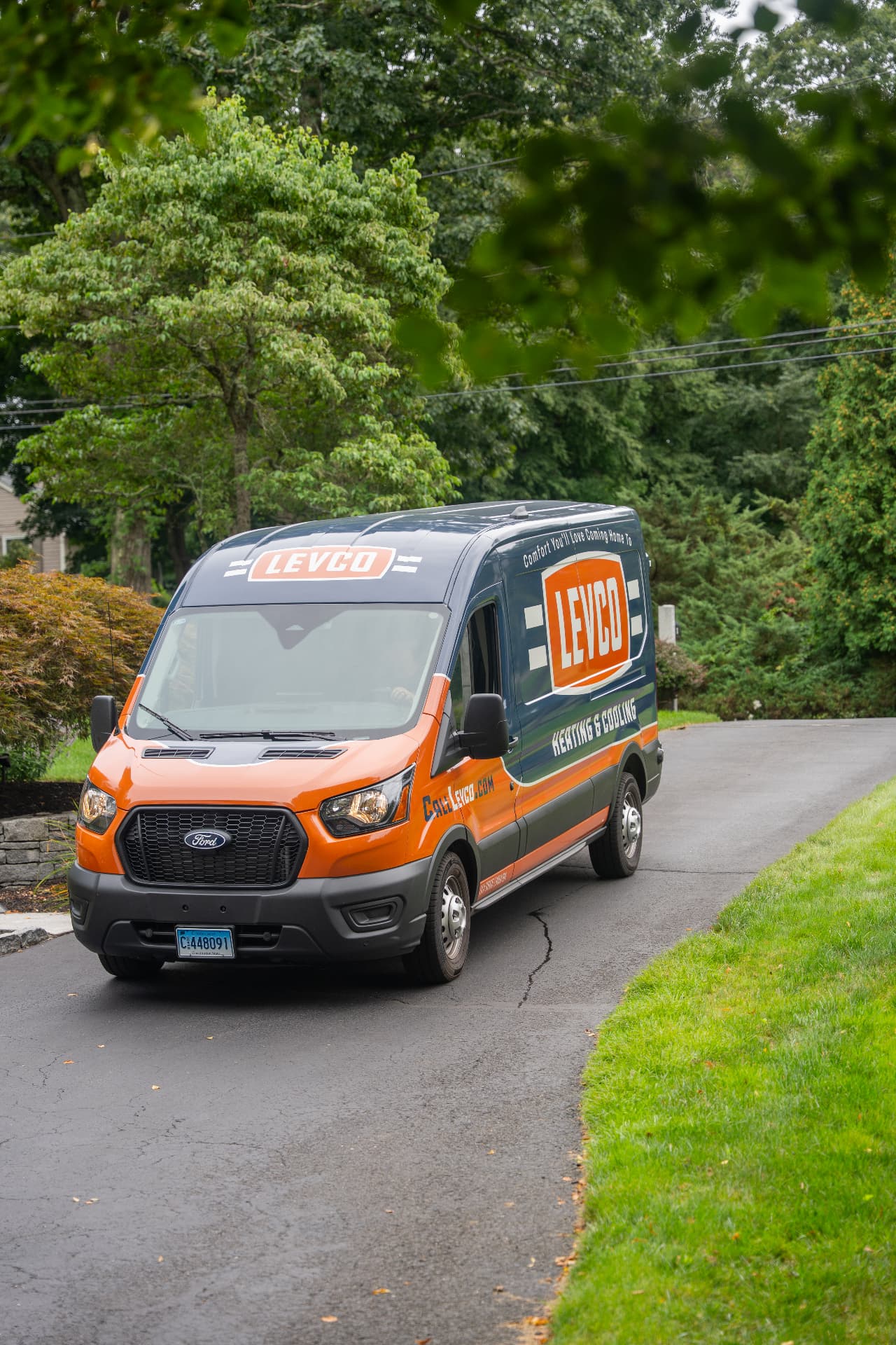 Levco service van arriving at a Connecticut home for a heating repair visit