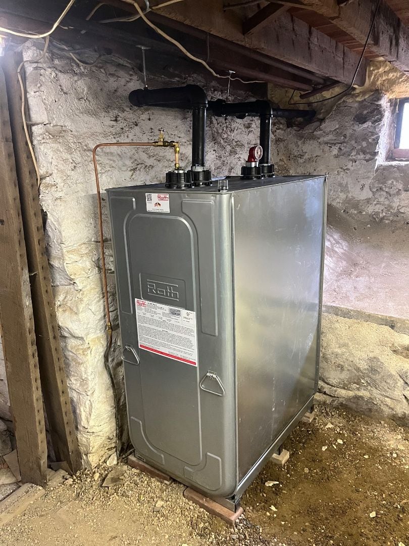 New Roth double-wall heating oil tank installed with finished fill and vent piping